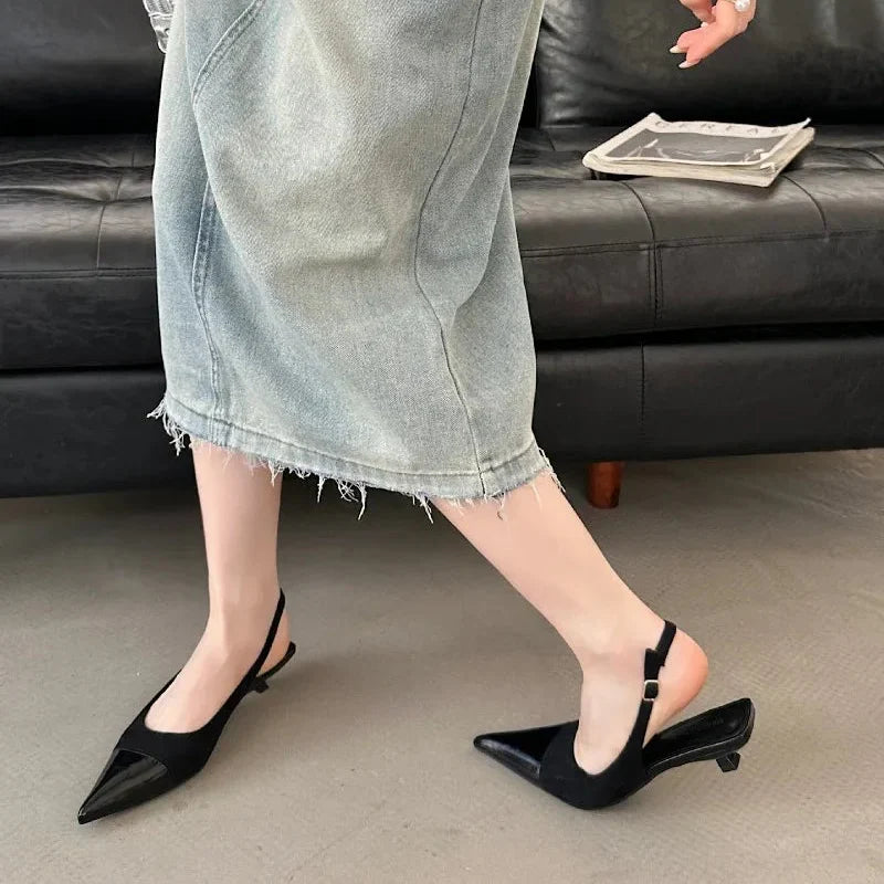 Alicia · Slingback in camoscio con tacco a rocchetto