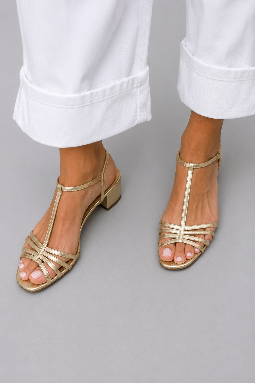 Allegra · Sandali dorati con tacco basso