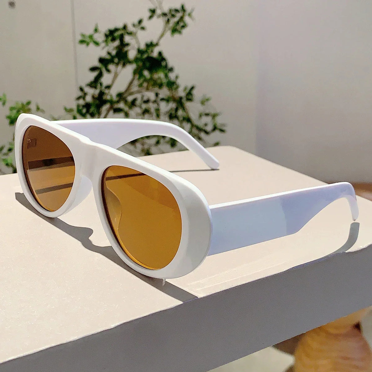 Allura · Occhiali da sole ovali oversize in acetato