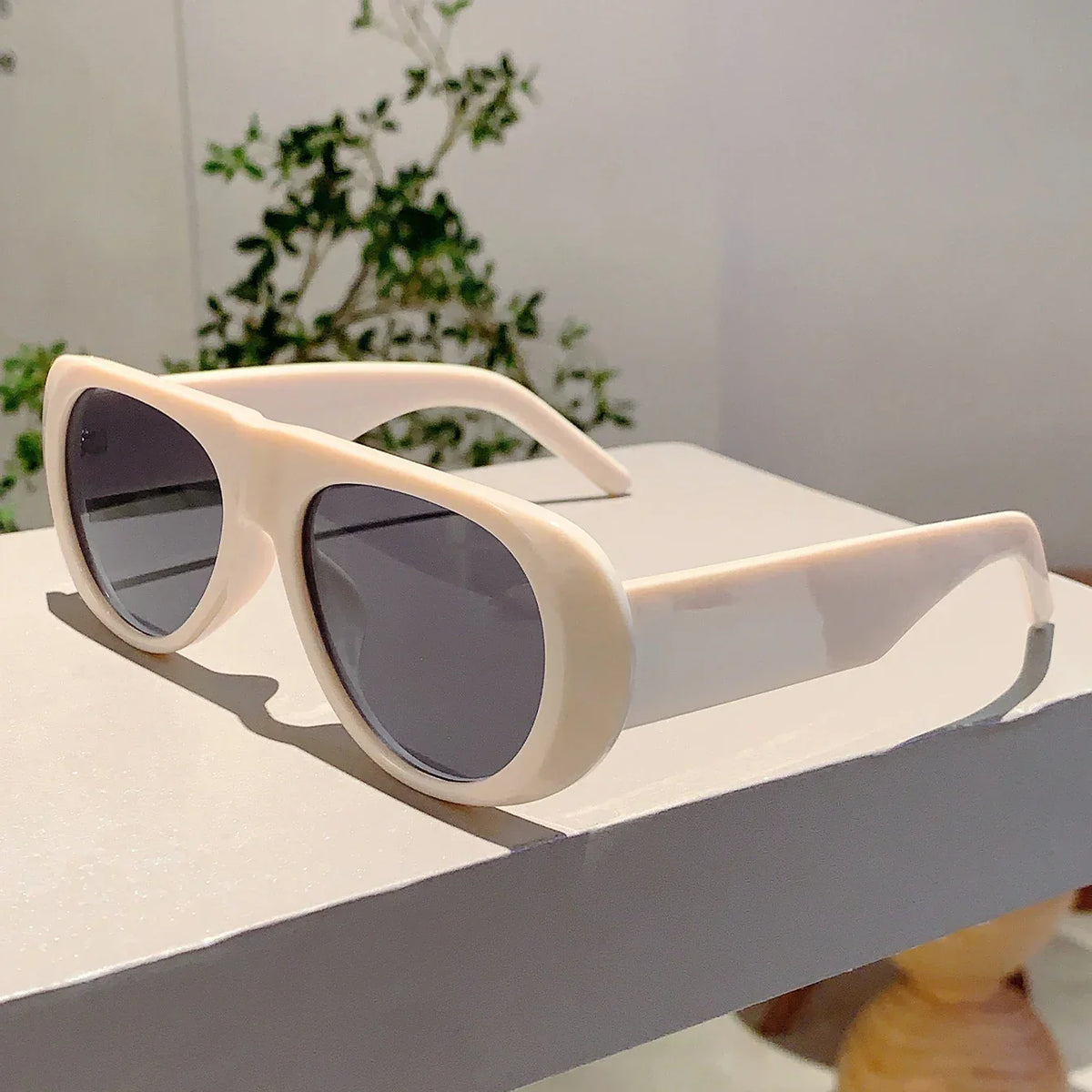 Allura · Occhiali da sole ovali oversize in acetato