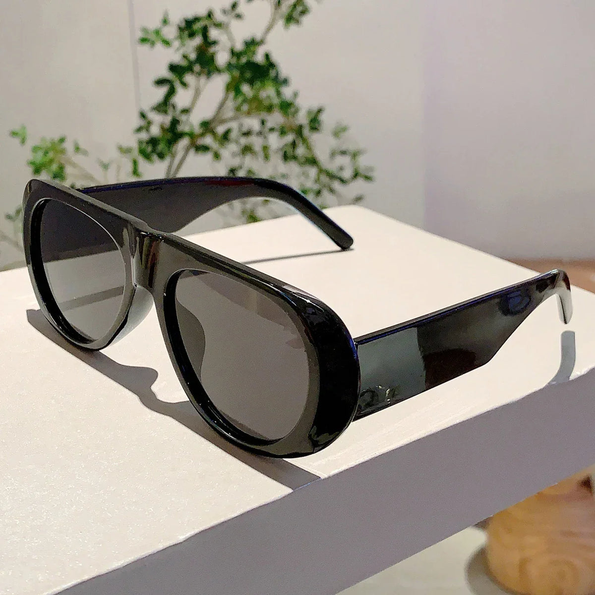 Allura · Occhiali da sole ovali oversize in acetato
